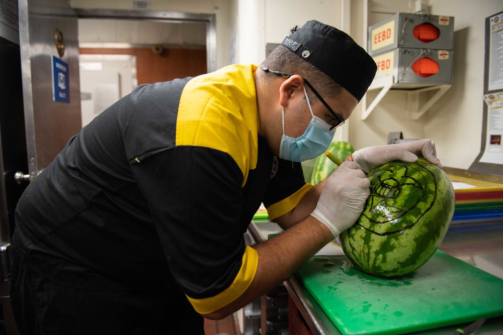 Sailor prepares food