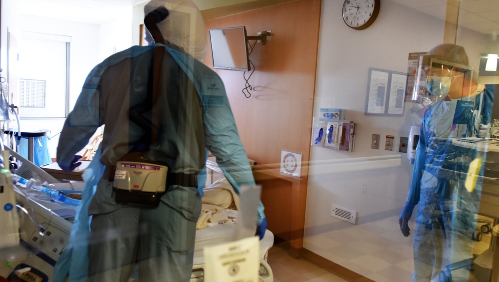 Doctors and nurses from 59th Medical Wing help with patient care at University Medical Center of El Paso