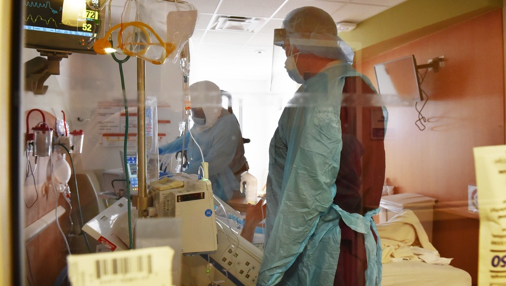 Doctors and nurses from 59th Medical Wing help with patient care at University Medical Center of El Paso