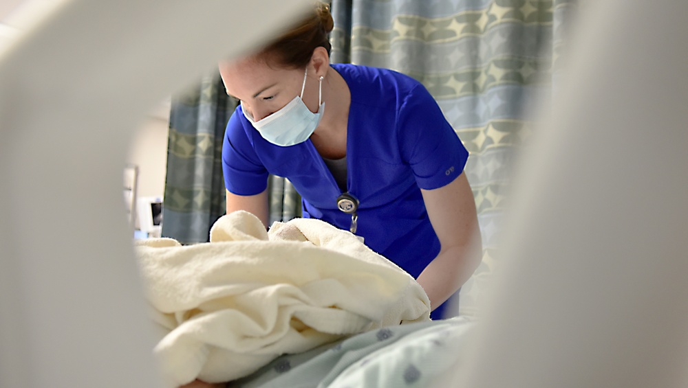 Doctors and nurses from 59th Medical Wing help with patient care at University Medical Center of El Paso