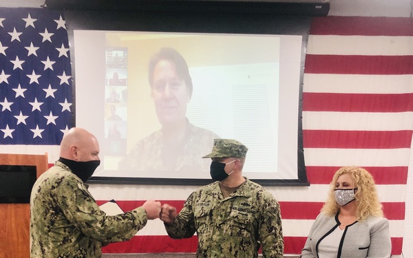 Coast Guardsman meritoriously advanced during virtual ceremony