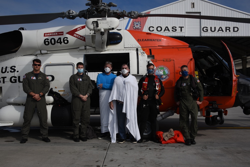 Coast Guard rescues 2 after boat sinks 40 miles west of Bradenton, FL