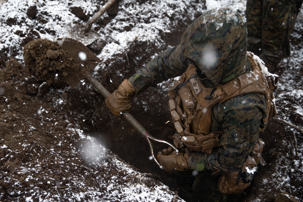 Marines with 3/8 and JGSDF members set up the defense line for Forest Light