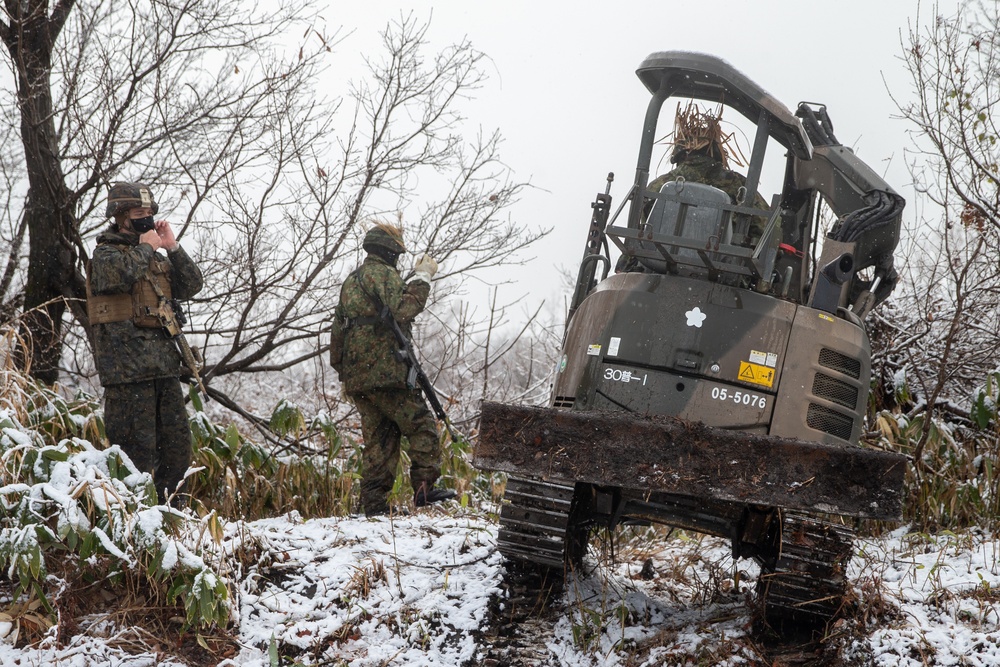 Marines with 3/8 and JGSDF members set up the defense line for Forest Light