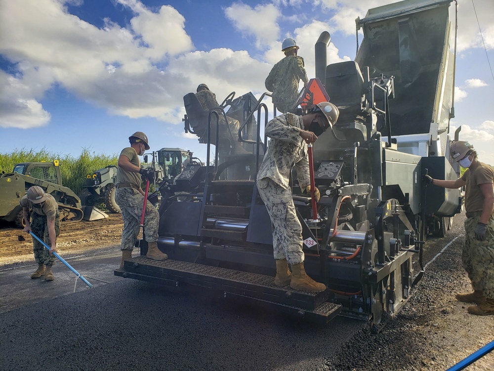 Seabees Pave Road in Tinian