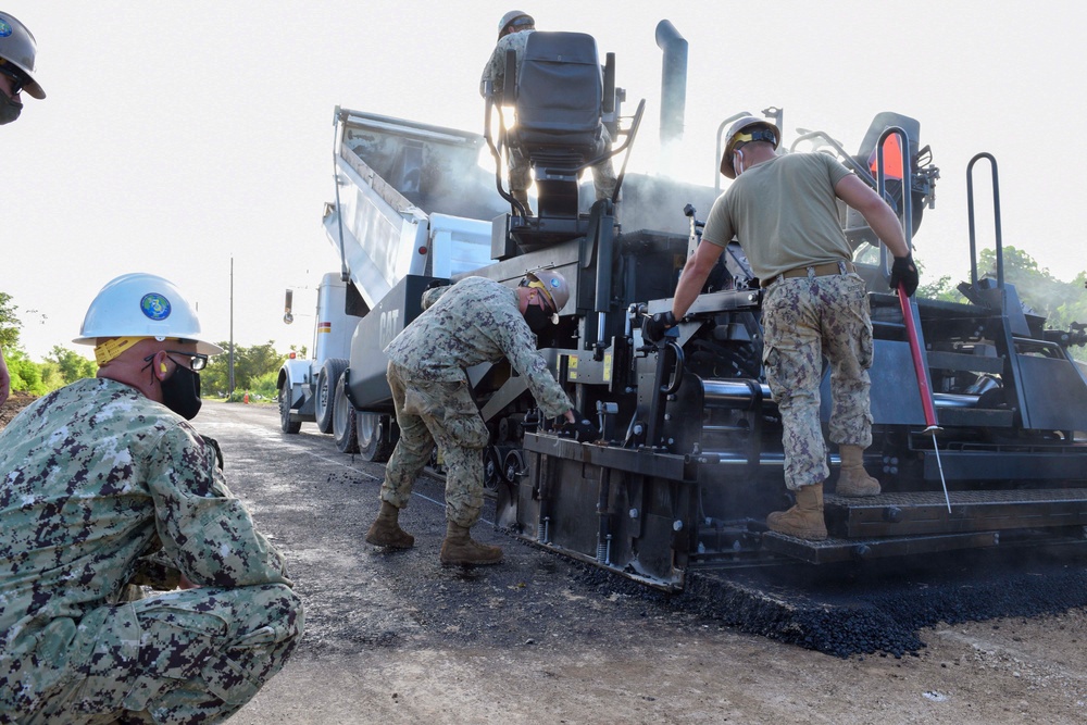 Seabees Pave Road in Tinian