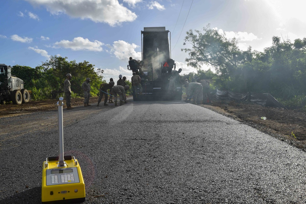 Seabees Pave Road in Tinian