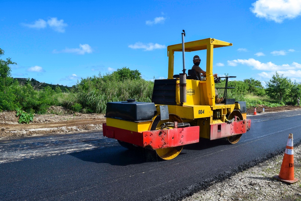 Seabees Pave Road in Tinian