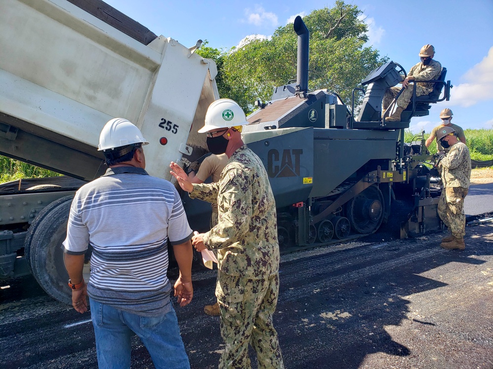 Seabees Pave Road in Tinian