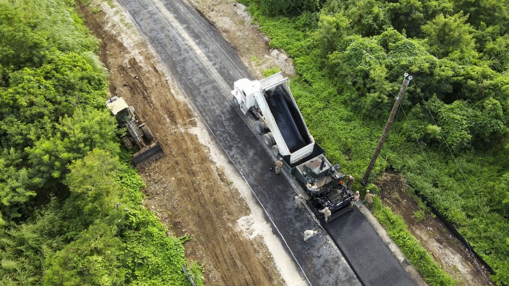 Seabees Pave Road in Tinian