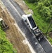 Seabees Pave Road in Tinian