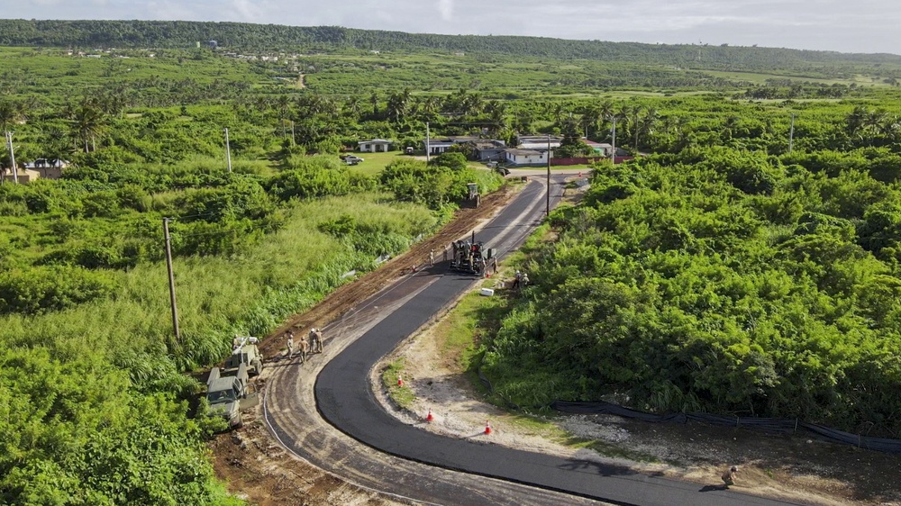 Seabees Pave Road in Tinian