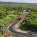 Seabees Pave Road in Tinian