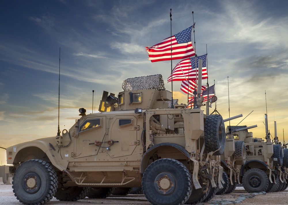 American Flags on some Mine Resistant Ambush Protected All Terrain vehicles known as M-ATV's