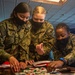 USS Constitution Sailors decorate stockings for the holidays