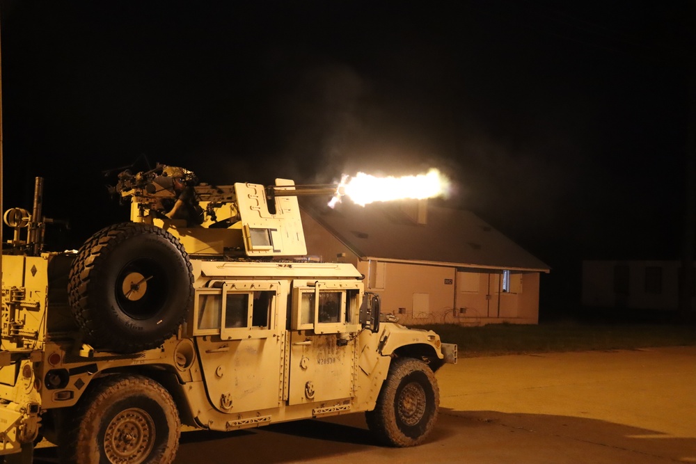 25ID Gunner firing from Humvee at night during a JRTC rotation