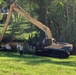 U.S. Army Corps of Engineers Jacksonville District uses excavator for debris cleanup
