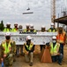 Sacramento District tops off clinic steel in ceremony