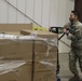 Arizona National Guard service members provide support at a Pima County PPE warehouse.