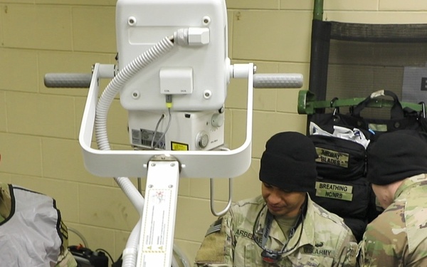 Patient getting X-ray in Field Hosptial environment