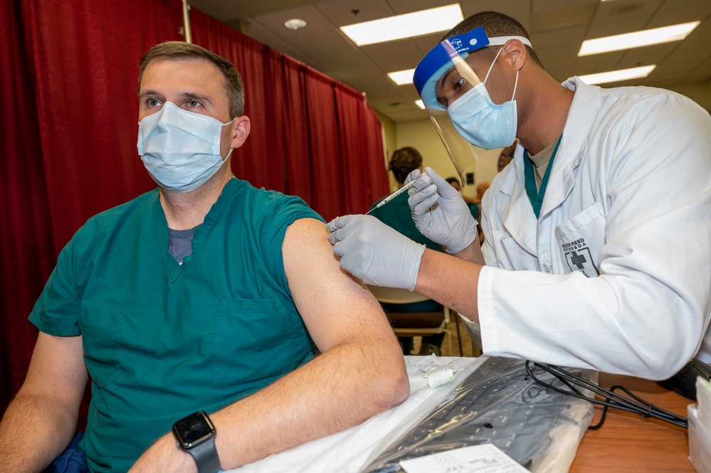 Medical Personnel at Walter Reed Receive COVID-19 Vaccine