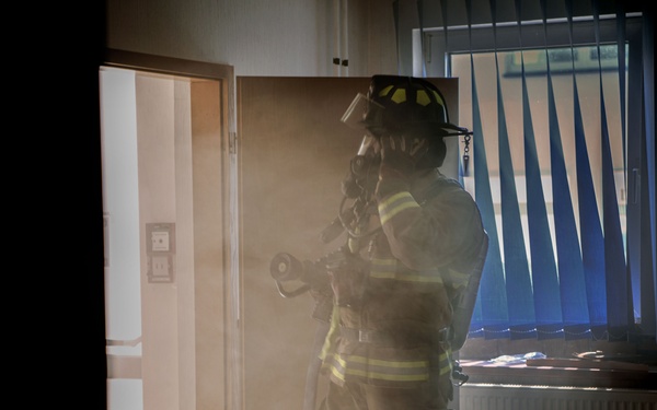 Firefighter Responds To A Fire During Readiness Training