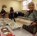 97 AMW Leaders deliver cookies to Airmen