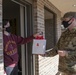 97 AMW Leaders deliver cookies to Airmen