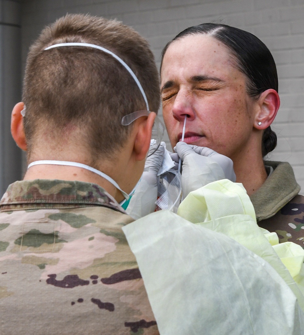 436th Medical Group superintendent demonstrates Covid-19 test