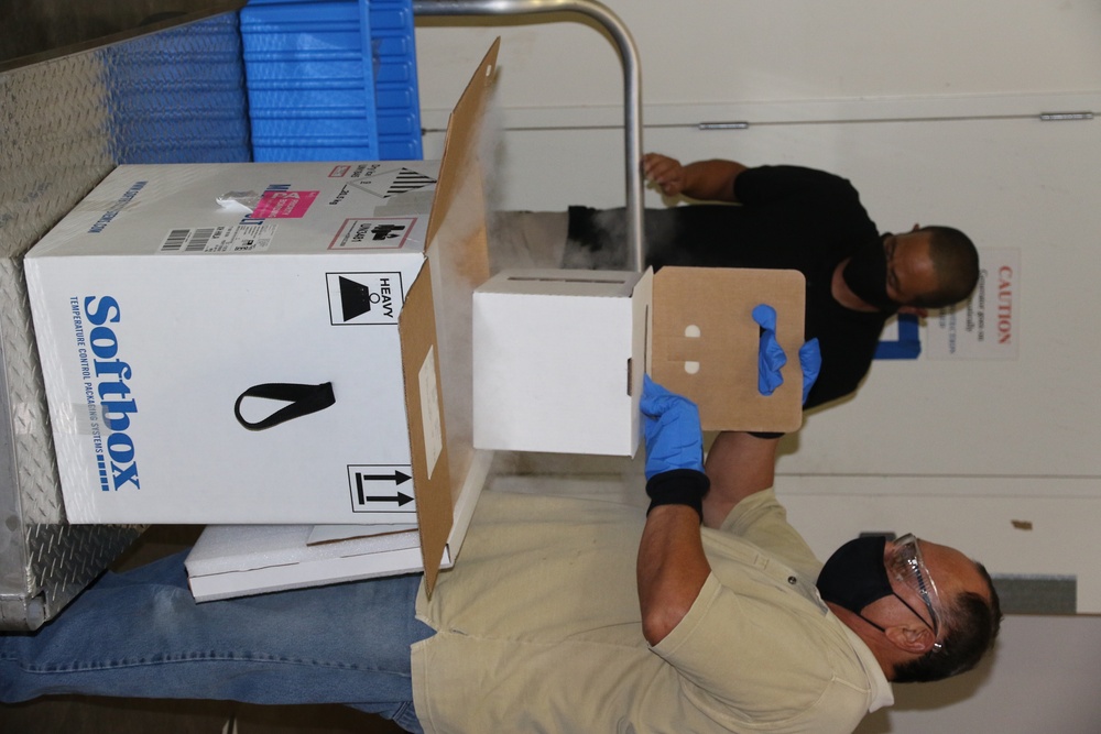 Tripler Logistics unpacks the vaccine shipment