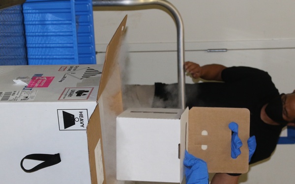 Tripler Logistics unpacks the vaccine shipment