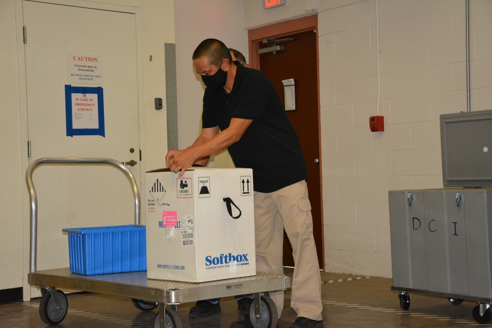 Tripler Logistics opens first box of the COVID-19 vaccine