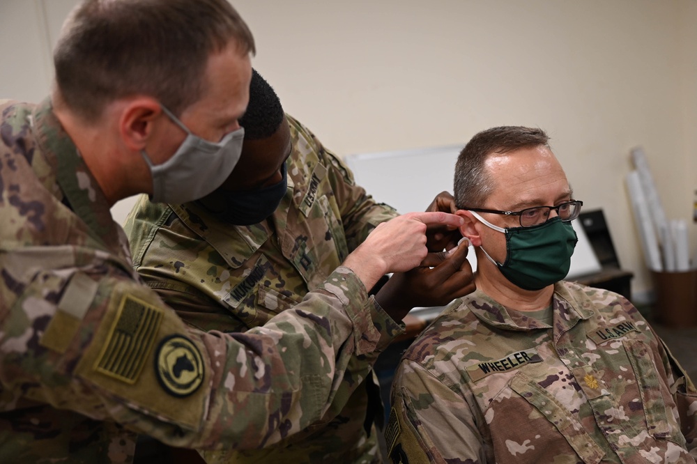 CJTF-HOA surgeon trains Soldiers on Battlefield Acupuncture
