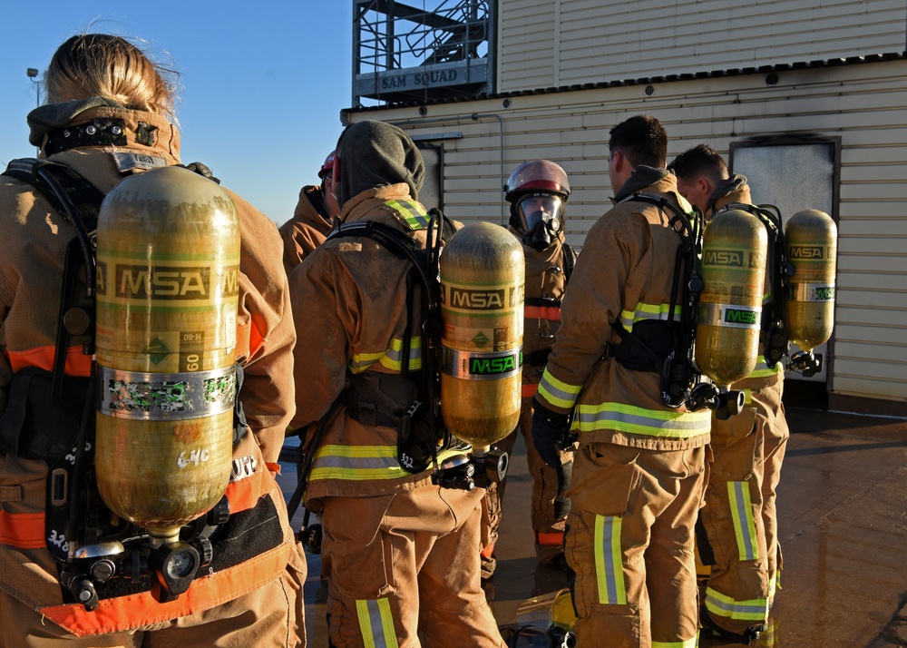 Firedogs douse burning interiors
