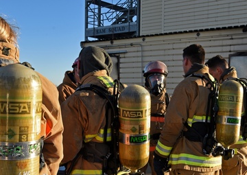 Firedogs douse burning interiors