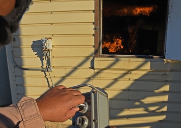 Firedogs douse burning interiors