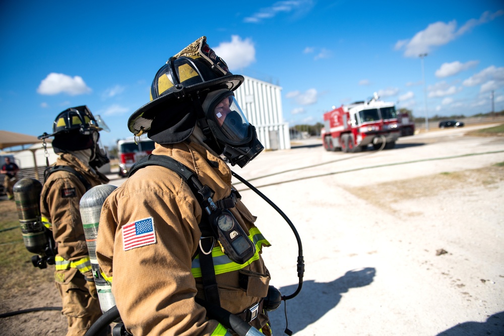 JBSA firefighters conduct semi-annual aircraft rescue, firefighting training