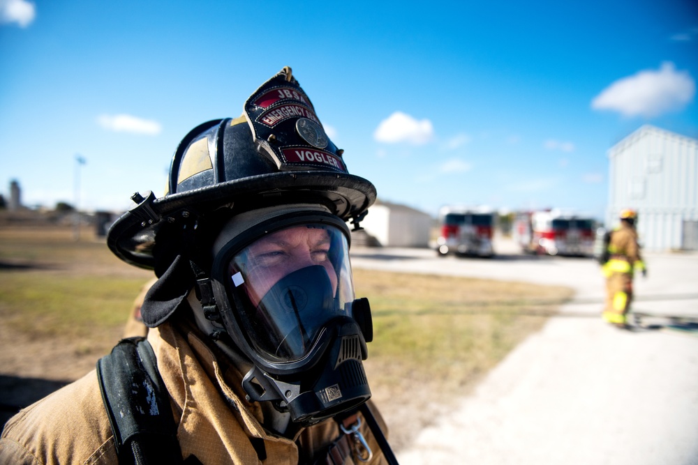 JBSA firefighters conduct semi-annual aircraft rescue, firefighting training