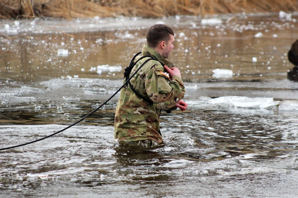 Soldiers participate in cold-water immersion event during CWOC training at Fort McCoy