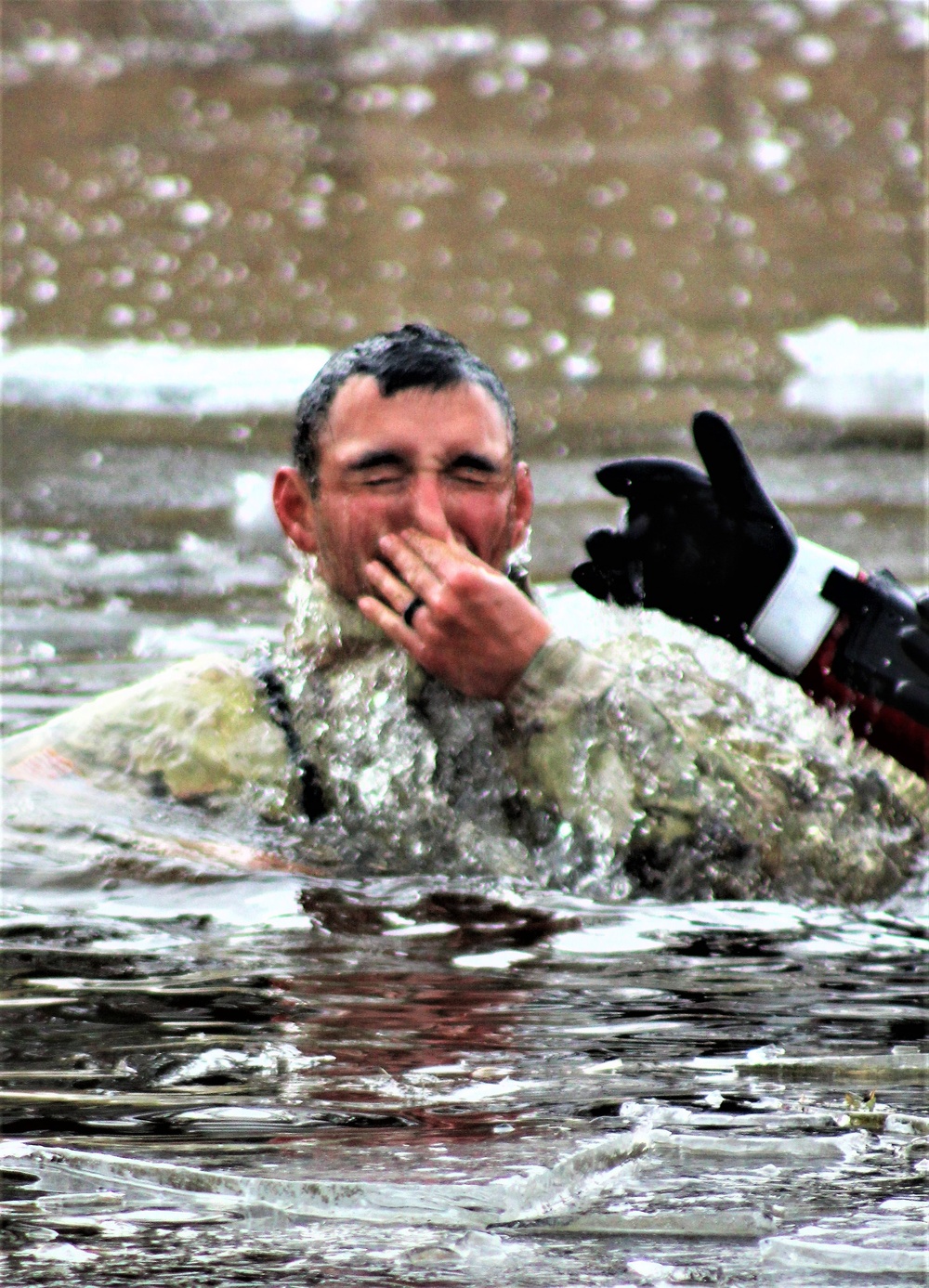 Soldiers participate in cold-water immersion event during CWOC training at Fort McCoy