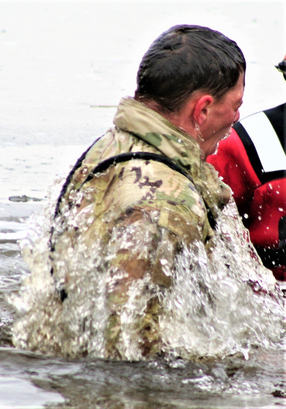 Soldiers participate in cold-water immersion event during CWOC training at Fort McCoy