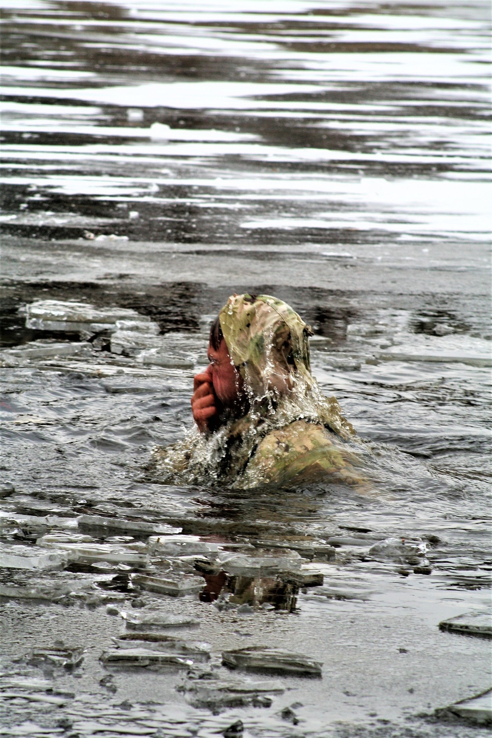 Soldiers participate in cold-water immersion event during CWOC training at Fort McCoy