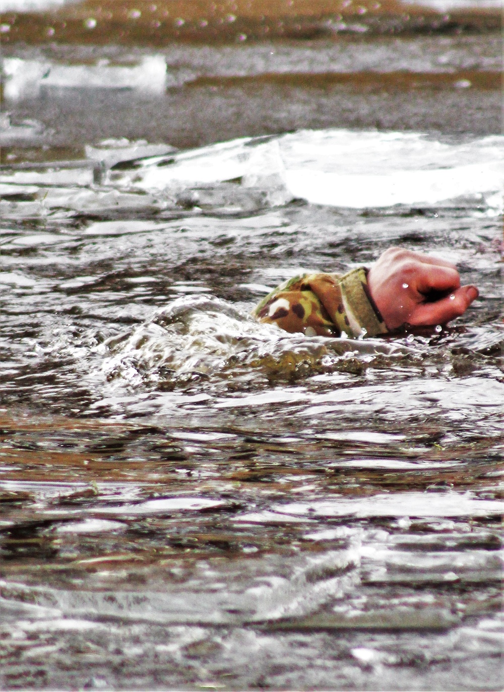 Soldiers participate in cold-water immersion event during CWOC training at Fort McCoy