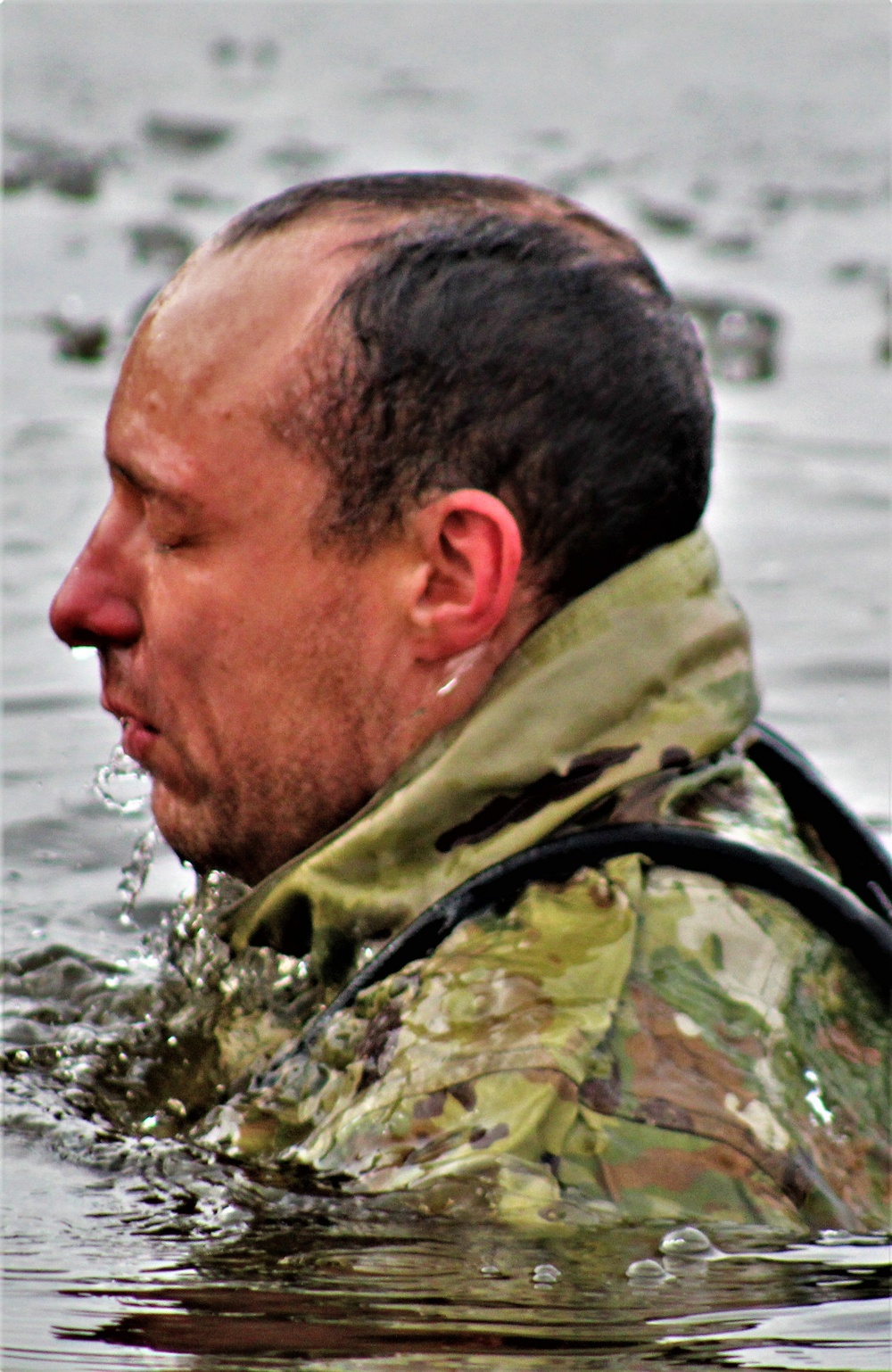 Soldiers participate in cold-water immersion event during CWOC training at Fort McCoy