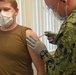 HM2 Timothy Maddox Administers the First COVID-19 Vaccine at NHCH
