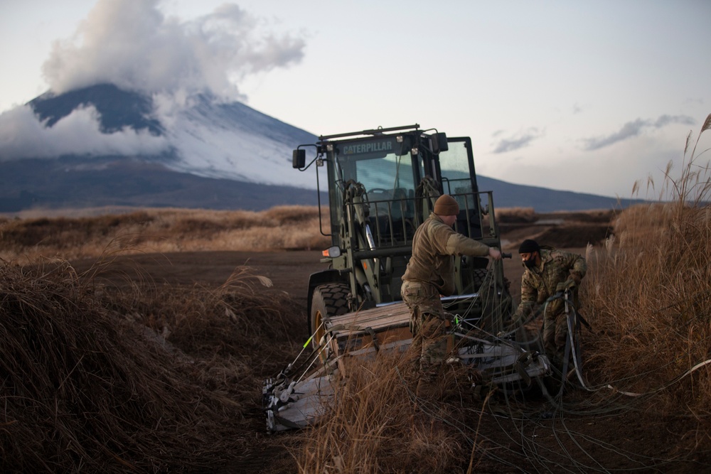 36th Airlift Squadron Conducts Drop Zone Training on CATC Camp Fuji