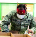 Michigan National Guard at food banks and soup kitchens, gathering food for the community