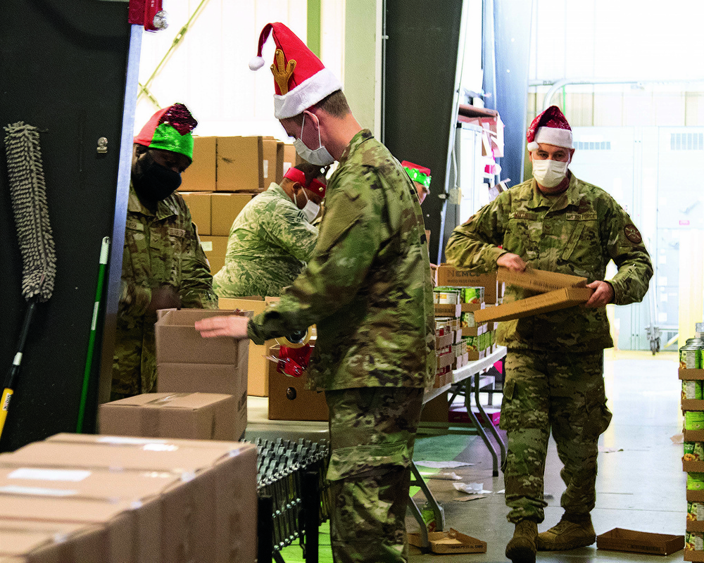 Michigan National Guard at food banks and soup kitchens, gathering food for the community