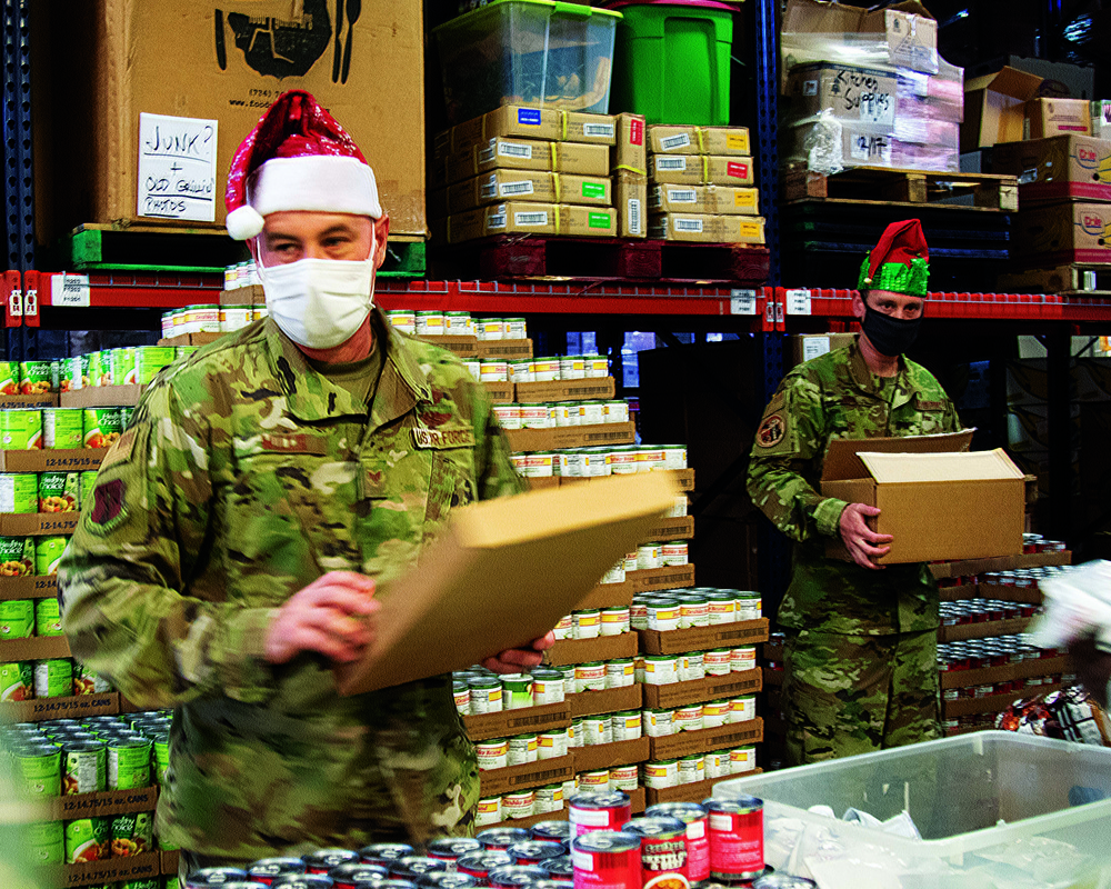 Michigan National Guard at food banks and soup kitchens, gathering food for the community