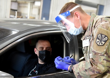 Arizona National Guard soldiers administer COVID-19 vaccine